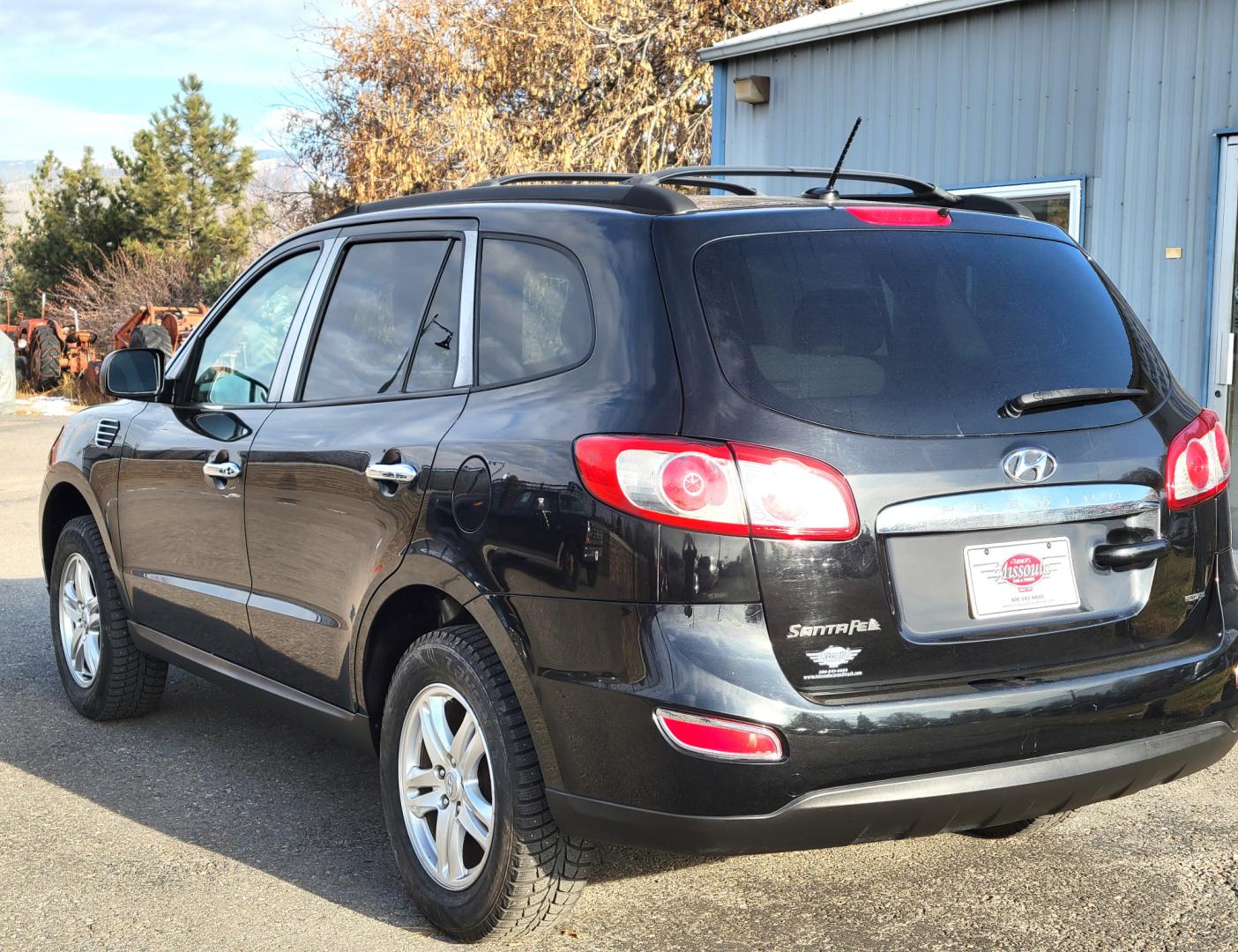 2012 Black /Tan Hyundai Santa Fe Premium (5XYZGDAB1CG) with an 2.4L I4 engine, 8 Speed Automatic transmission, located at 450 N Russell, Missoula, MT, 59801, (406) 543-6600, 46.874496, -114.017433 - NICE AWD SUV. Automatic Transmission. Air. Cruise. Tilt. Power Windows and Locks. AM FM XM Cd Player. Bluetooth. Two Sets of Tires. Studded Snow Tires are currently on. - Photo#7